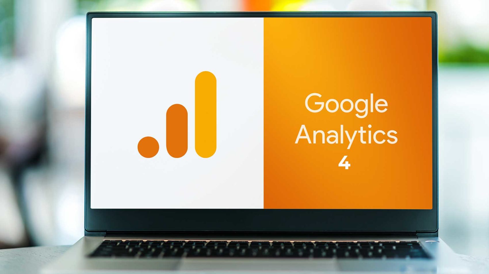 Laptop with a Google Analytics in orange on the screen