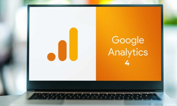 Laptop with a Google Analytics in orange on the screen